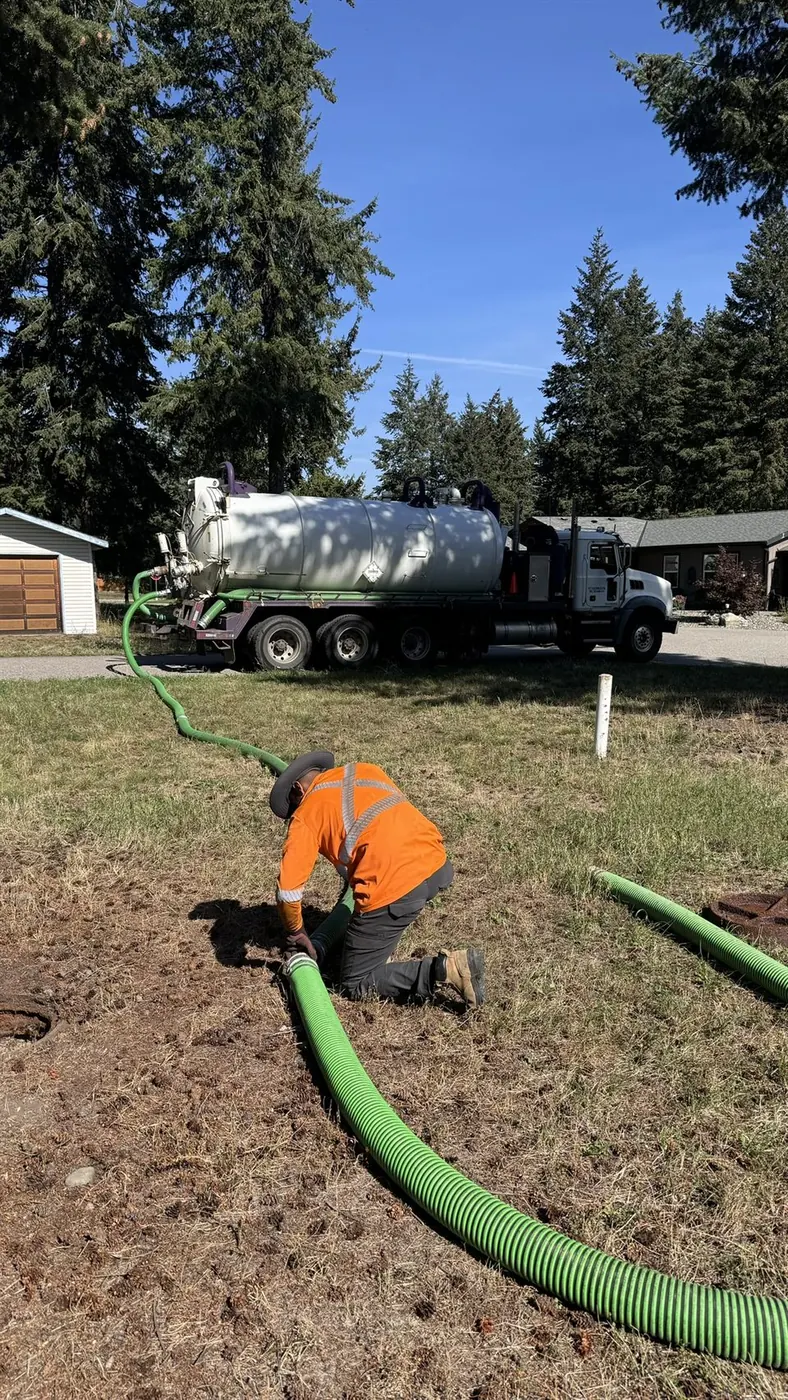 Salmon Arm Septic crew pumping a residential septic system